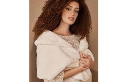 Why is a fur shawl a trendy clothing item